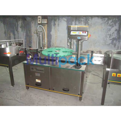 Roll-On Filling Machine - Rollon bottle Filling, Plug Pressing and Capping Machine